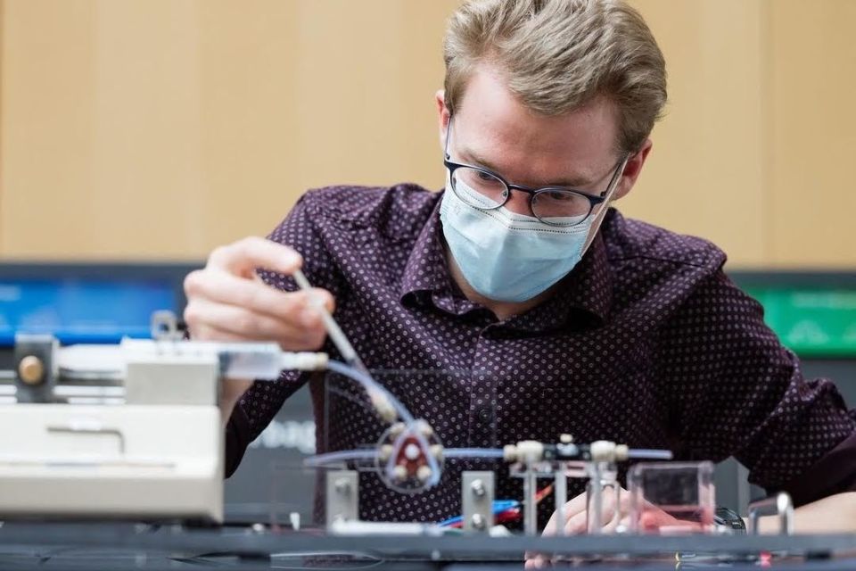 UBC Engineering student Lewis Arnold working on his Capstone project