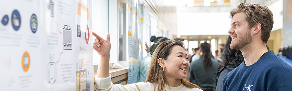 Two people discussing a project