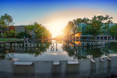 University of British Columbia sign above water