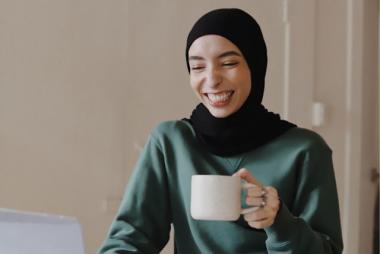 Woman having an online coffee or tea chat. 