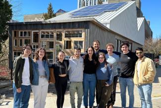 Members of the Third Quadrant Design team in front of the Third Space Commons project