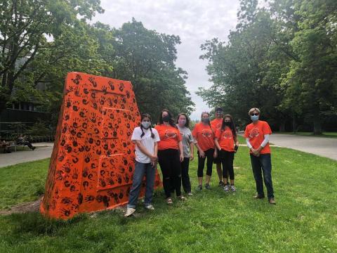 Students, faculty, staff and family painted the cairn, as we mourn the 215 children discovered at the Kamloops Indian Residential School.