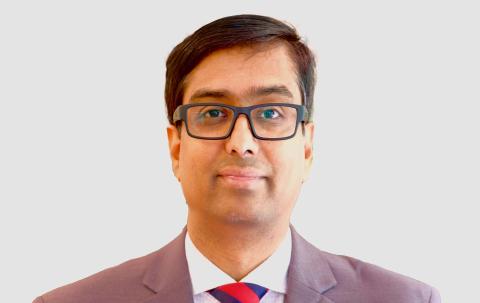 Professor Bhushan Gopaluni poses in front of a white background