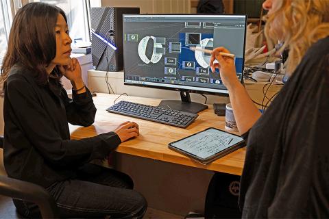 Dr. Megan Smith and Sessional Lecturer Gao Yujie discuss their work on an installation in UBC Okanagan’s Faculty of Creative and Critical Studies.